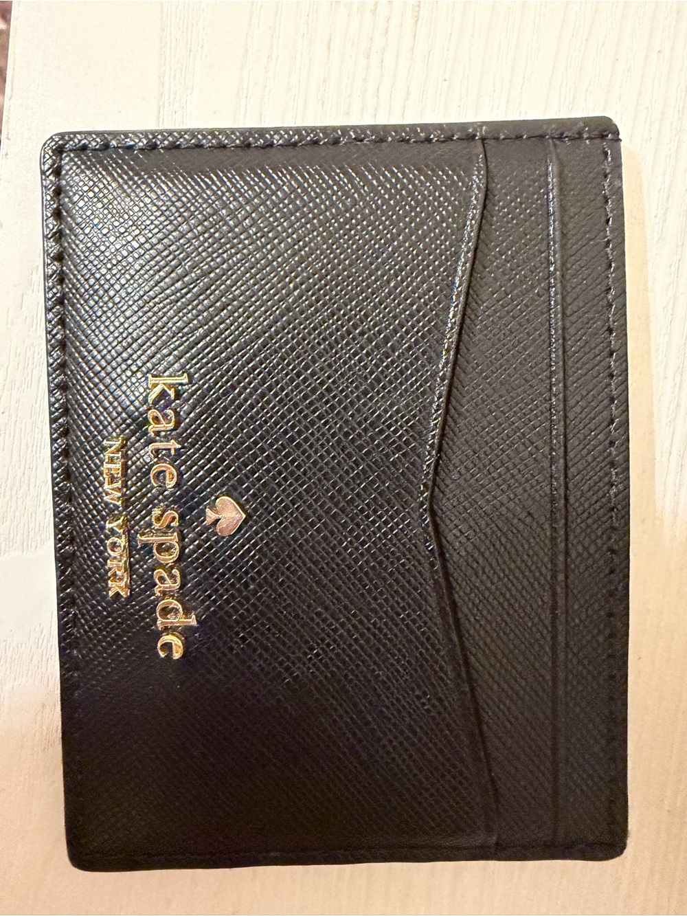 kate spade black saffiano card case with gold logo